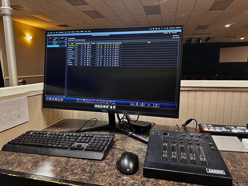 The lighting computer and lighting board on the desk