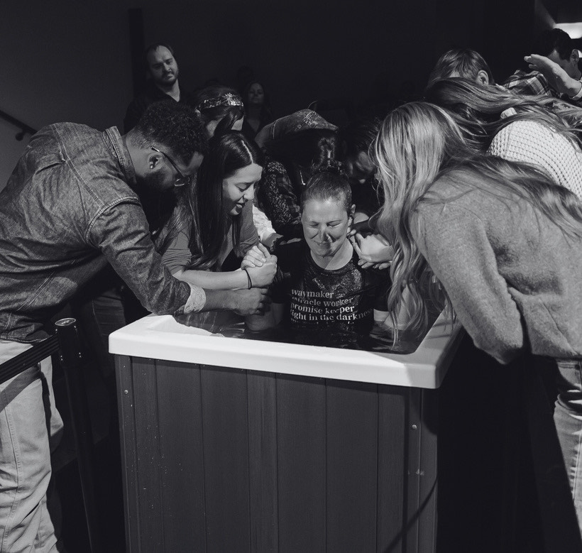 Friends gathered around a baptism