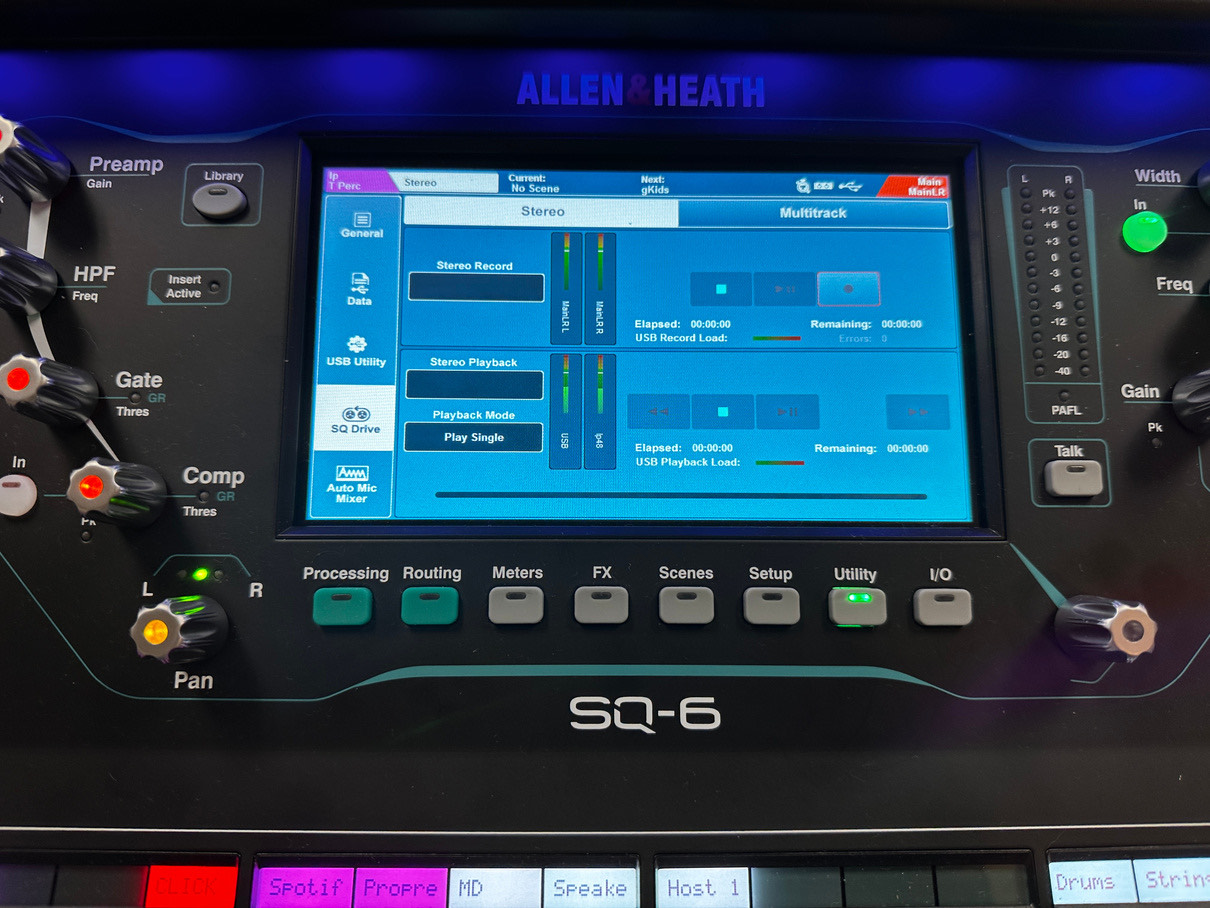 The SQ-6 touch screen with the Utility button below it